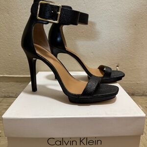 Never worn Calvin Klein black heels
